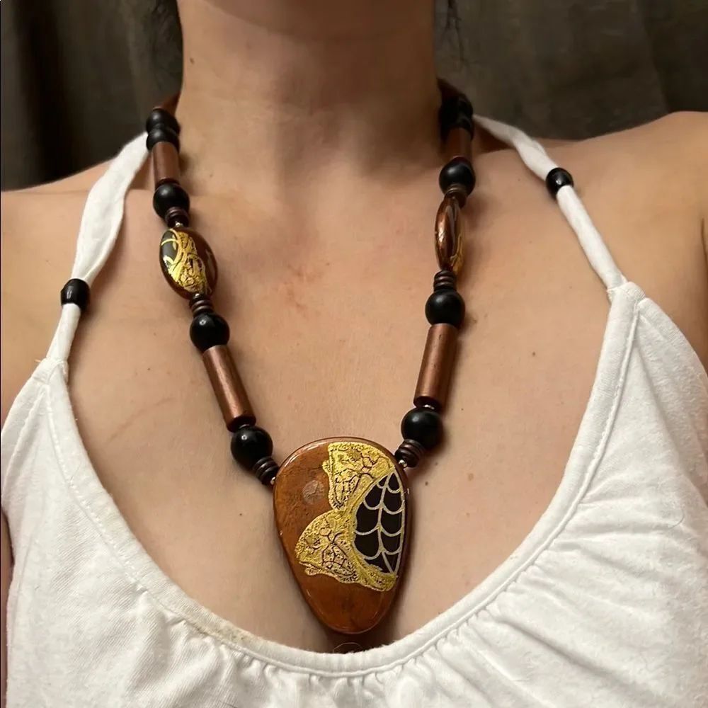 Gold and Black Necklaceβwith Tribal Inspired Pendant